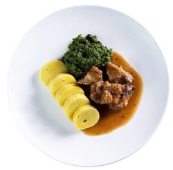 Roast pork with potato dumplings and spinach by Jan Bures