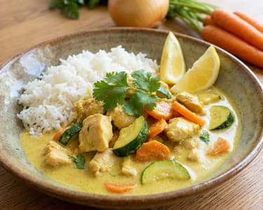 Chicken Strips in Curry Sauce with Zucchini and Carrots