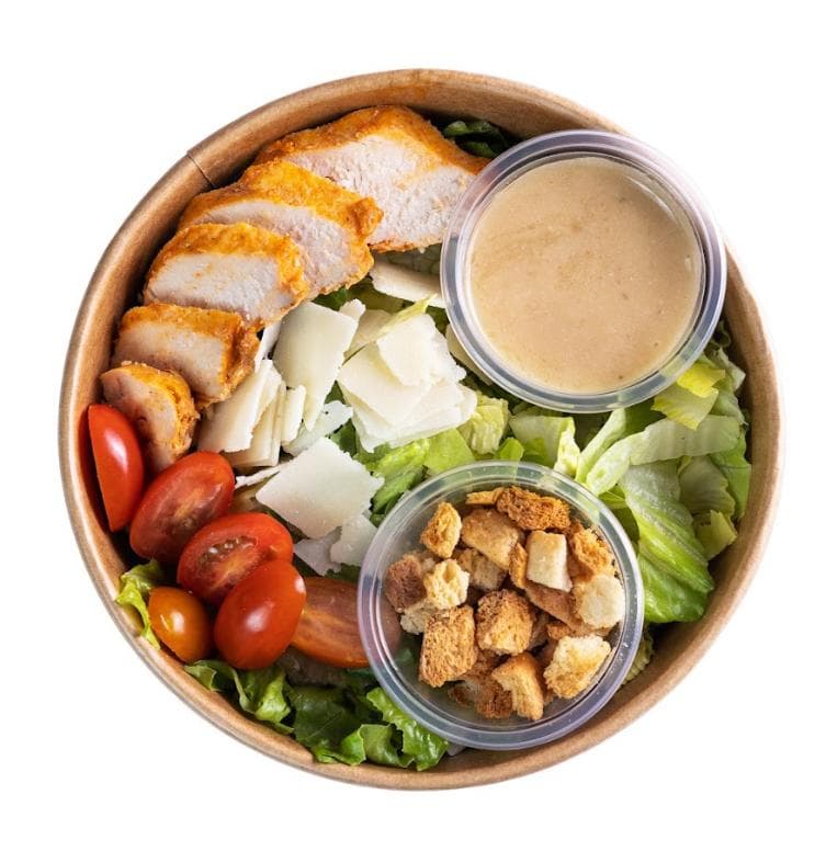 Pappudia Caesar Salad with Chicken, Dressing, Quail Eggs, Croutons, English Bacon, and Grana Padano Cheese (PDO)