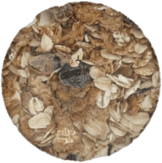 Marks & Spencer whole grain muesli made from wheat, oats, wheat bran, and barley flakes with dried fruits, seed mix, spelt flakes, chopped roasted hazelnuts, and roasted coconut chips