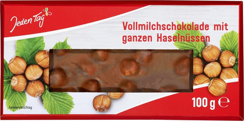 Jeden Tag Vollmilchschokolade mit ganzen Haselnüssen