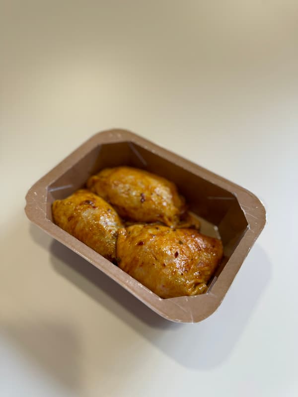 Traditionsgeflügel Hähnchen Keulensteak mariniert Curry